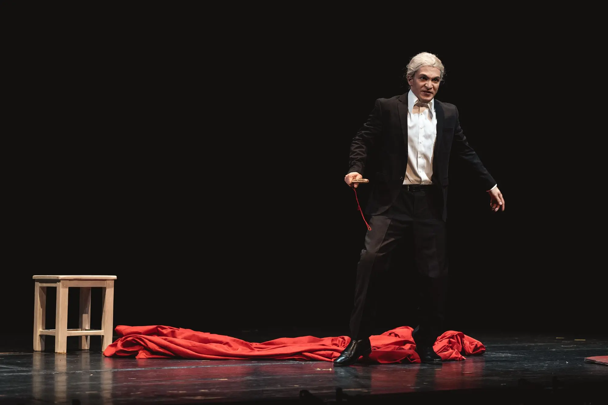 Baritone Biran Özgür Sariyer as Ser Matteo del Sarto in Arlecchino, HMT Leipzig