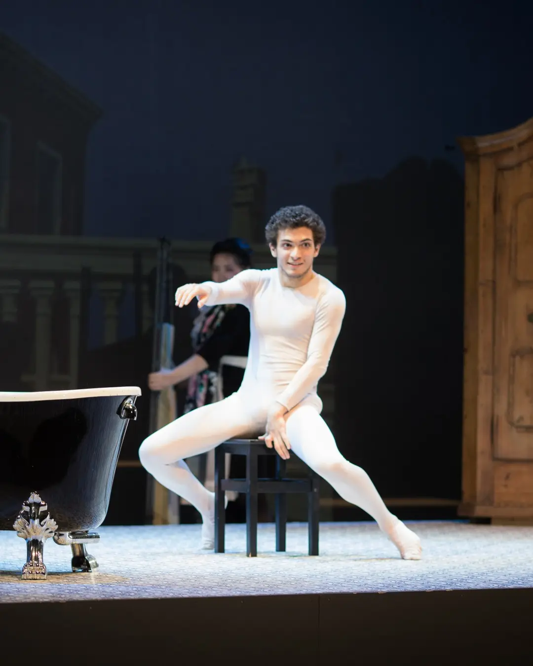 Baritone Biran Özgür Sariyer as Harlequin in Die vier Grobiane, Folkwang University of the Arts, Essen